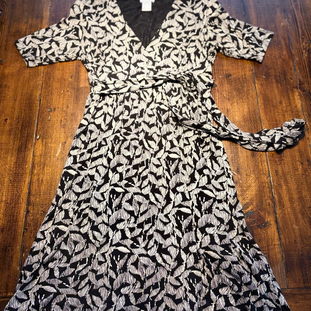 Elegant Black and White Patterned Wrap Dress